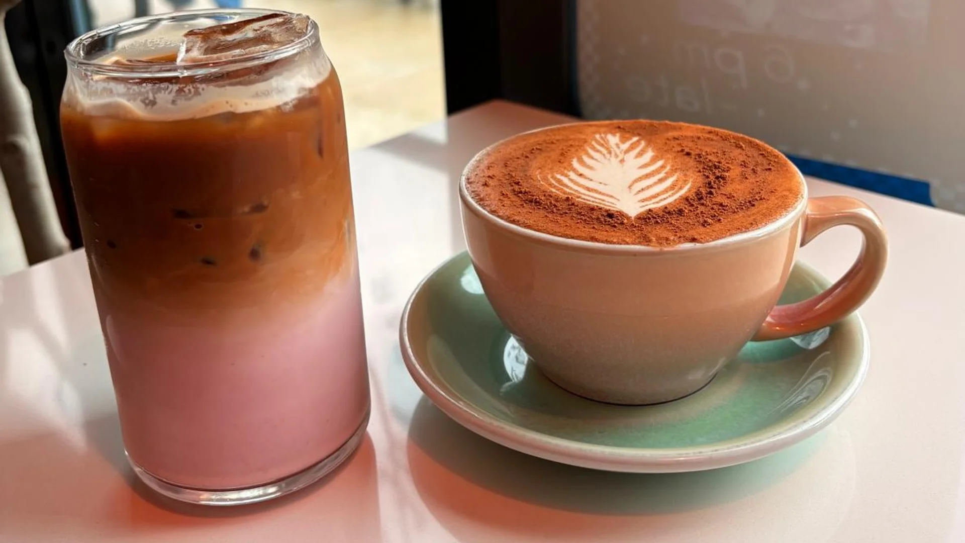 Passenger Princess specialty coffee served in a clear glass and Chai Latte served in a mug at The Greenhouse Bar in Jacksonville, Florida.